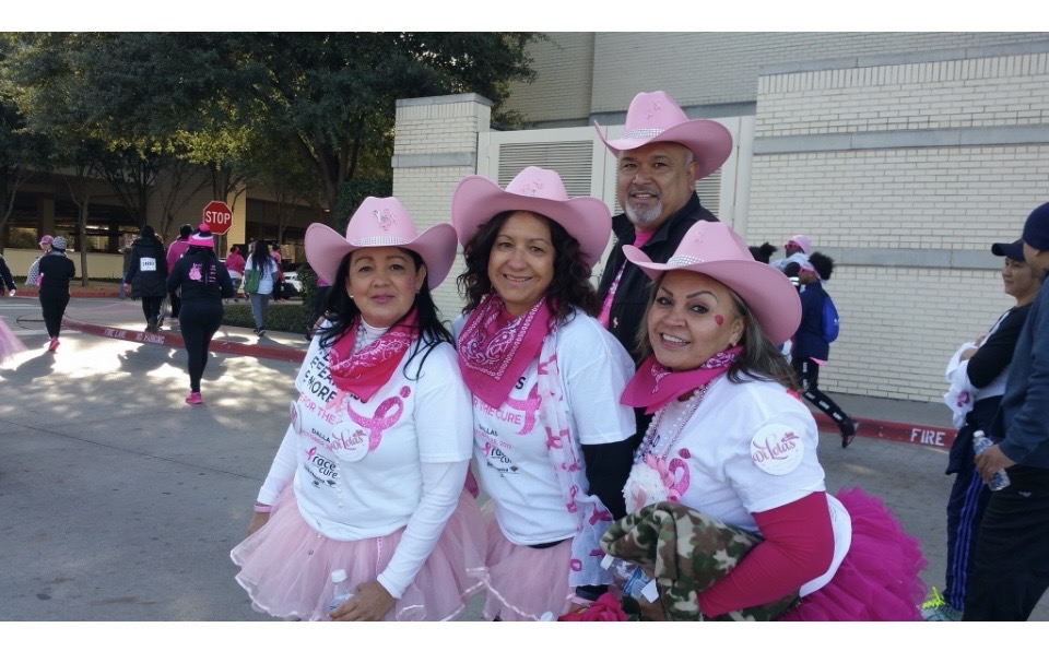 Group in pink cowboy hats at the Breast Cancer Walk